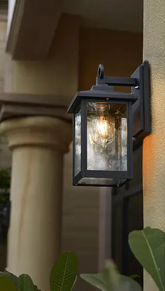 Vintage Bronze Outdoor Wall Sconce in use